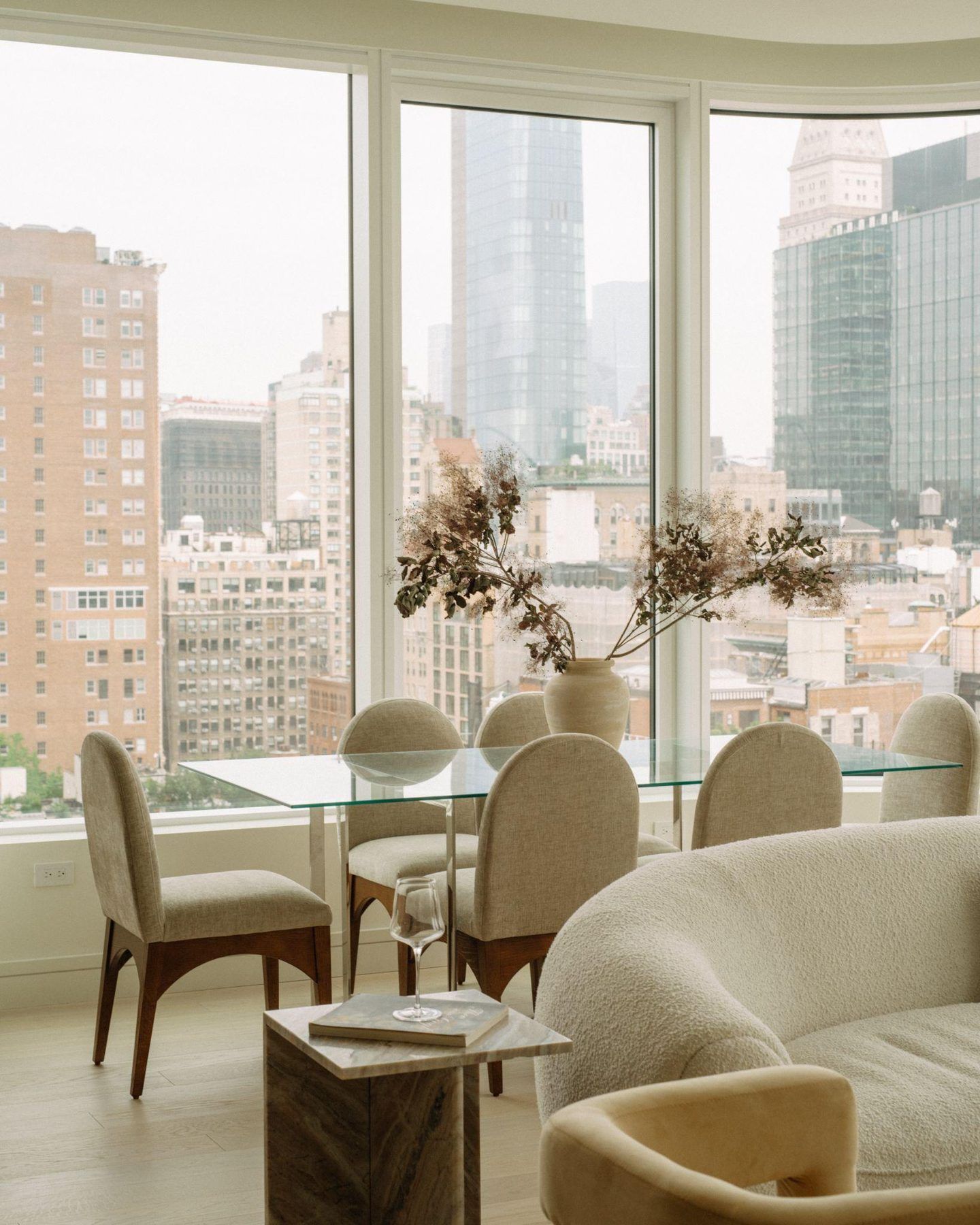Penthouse living and dining room at 200 East 20th Street, Gramercy Park, staged by Stage One